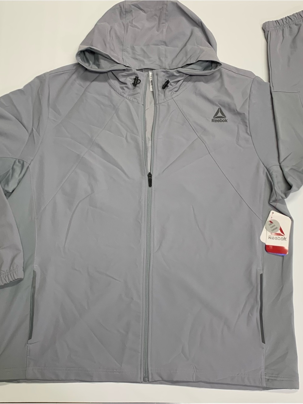 Reebok Men's Swiftmotion
Woven Jacket